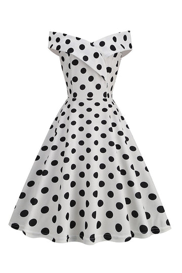 Robe vintage à pois blanc sur les épaules